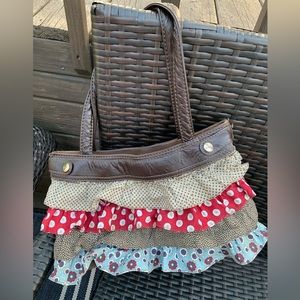 Thirty-one purse with two covers.